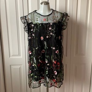 Black dress with floral overlay